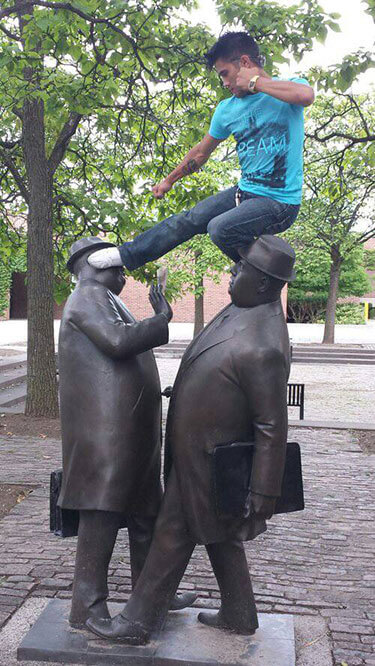 people having fun with statues 22